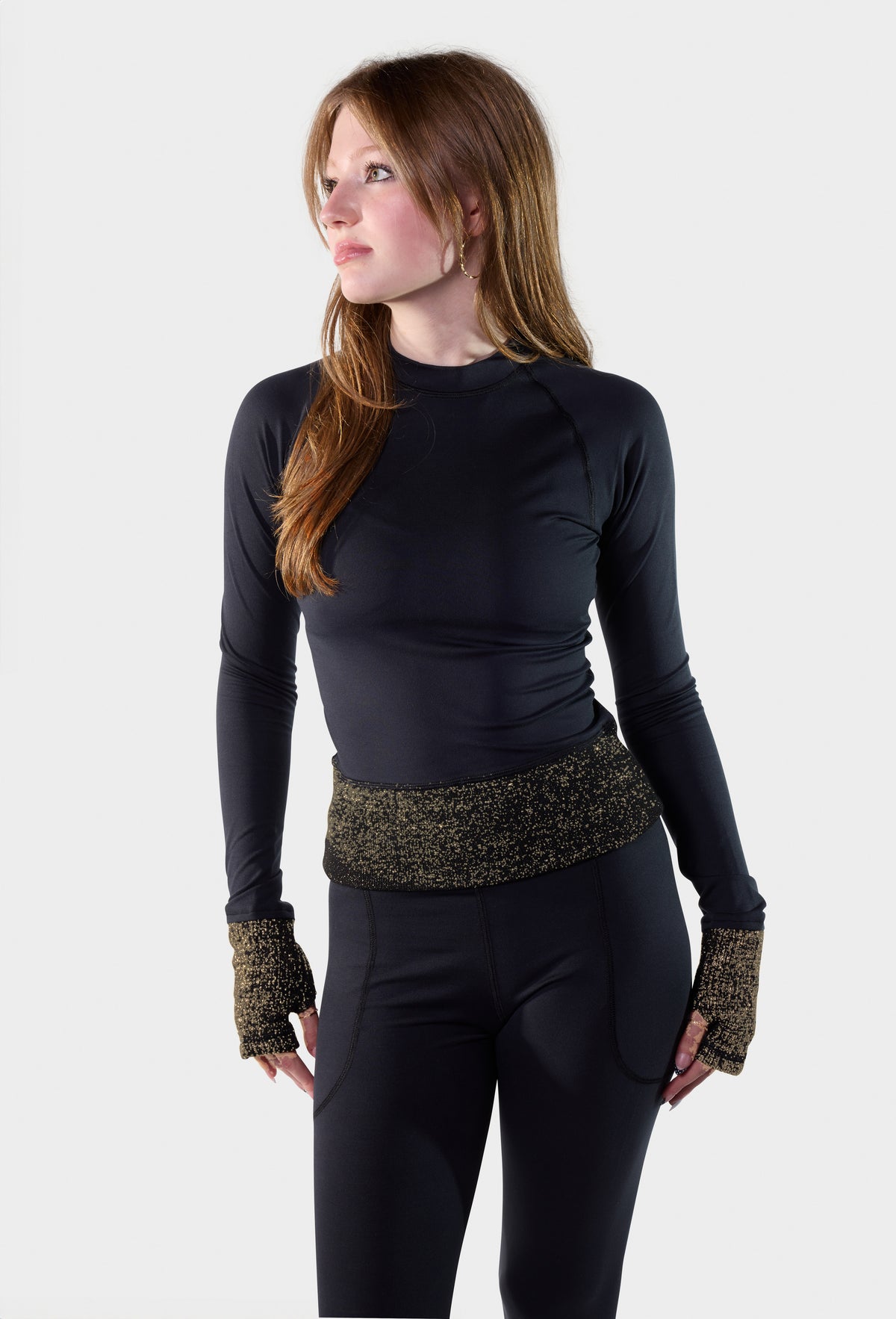 Front view of the black Paggo Athena Top with Lurex waistband and cuffs