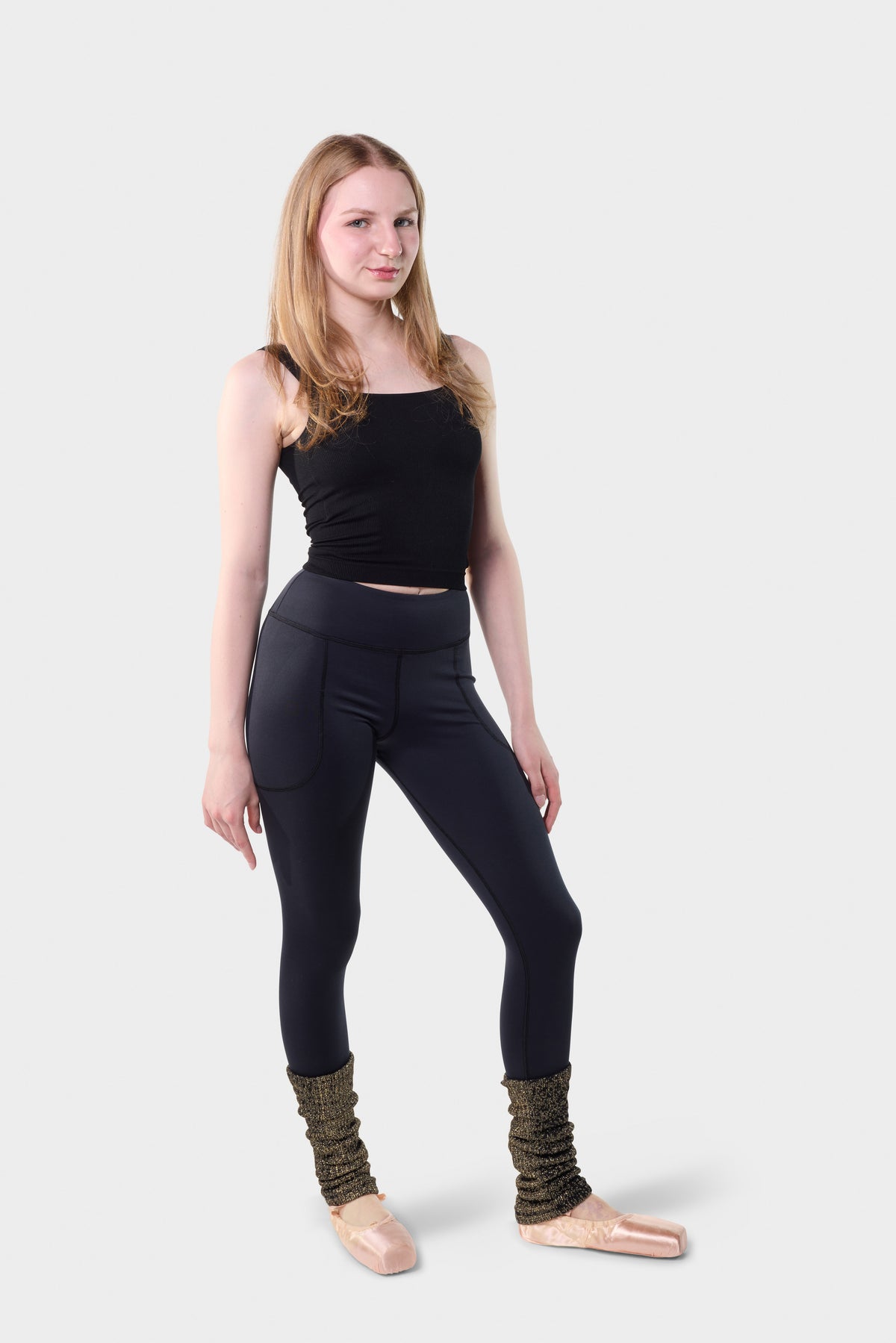 Front full-length view of the black Paggo Christina Pants with Lurex ankle warmers