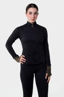 Front view of the black Paggo Elena Long Jacket with Lurex cuffs, worn with the Christina Pants