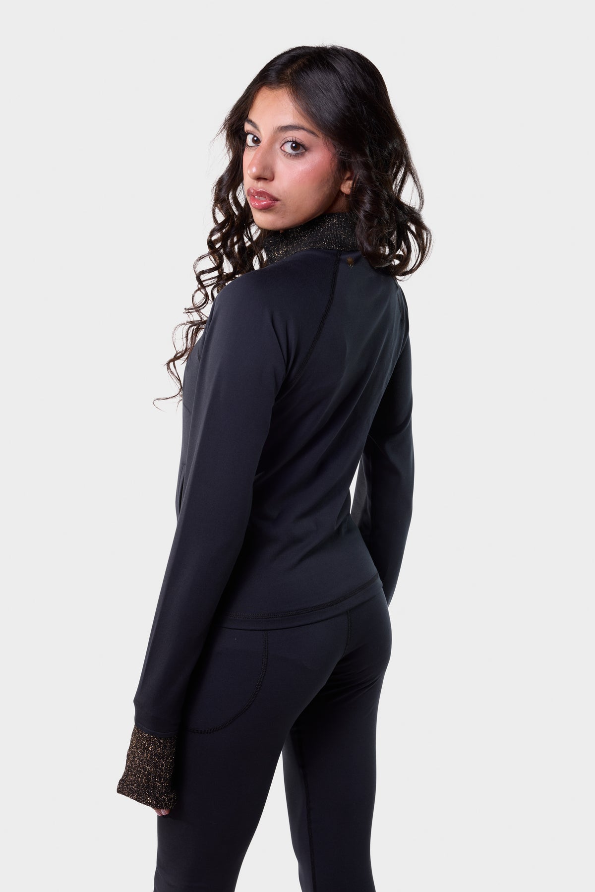 Back view of the black Paggo Silvia Cropped Jacket with Lurex cuffs