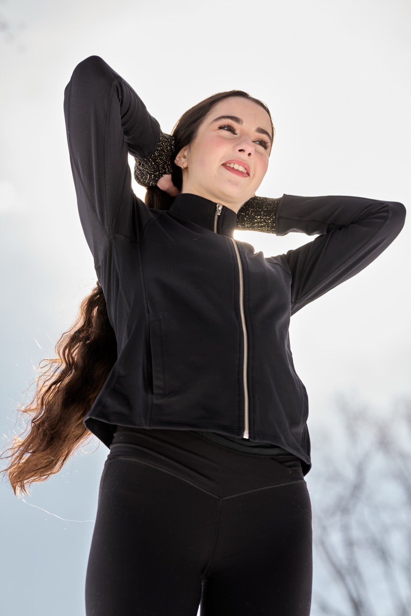 Paggo movement apparel photographed beneath an open sky